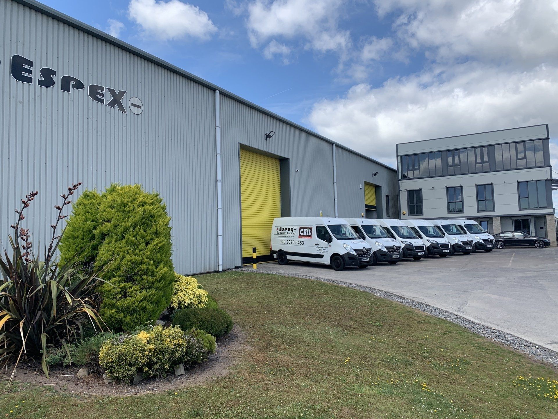 Espex service vans outside the company's warehouse
